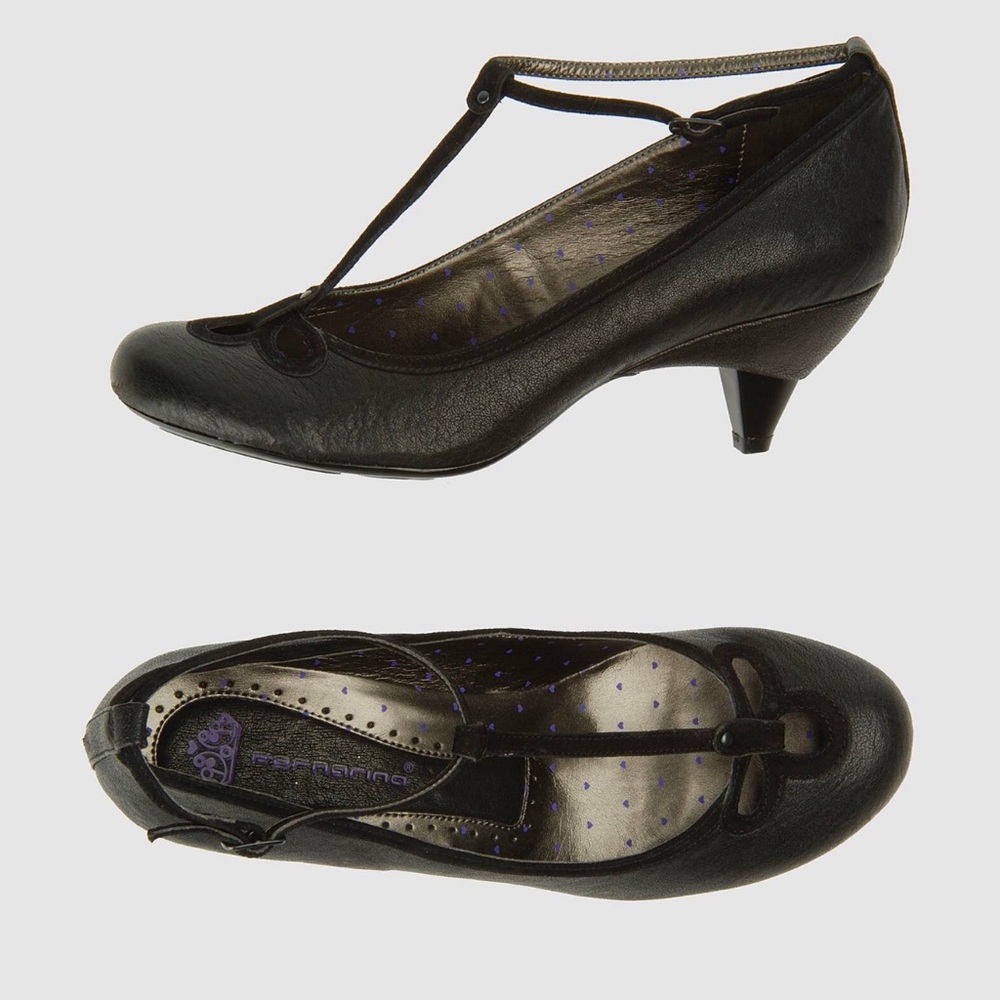 Black Mary-Janes with kitten heels.